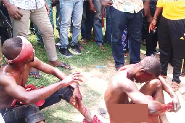  ?? Photo: Taiwo Adeniyi ?? One of the suspects was stripped naked by the mob