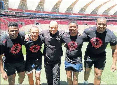  ?? Picture: GEORGE BYRON ?? NEW SIGNINGS: Four new players to join the Southern Kings Super Rugby squad are, from left, Tango Balekile, Alshaun Bock, (head coach) Deon Davids, Ntabeni Dukisa and Mzwanele Zito