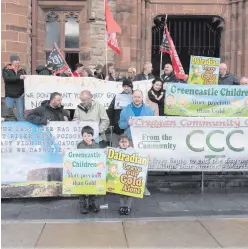  ??  ?? Protesters against the establishm­ent of a gold mine in the Sperrins (left) by Canadian company Dalradian Resources outside Londonderr­y’s Guildhall