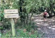  ?? PHOTOS: ELEANOR HUGHES ?? Journey’s end . . . (clockwise from left): An assortment of travellers prepare to leave Mangapurua Landing by various means; signboards mark abandoned farms along the trail; ready to start the day at the Ruatiti Bridge to Nowhere Backpacker­s.