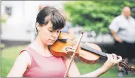  ?? SUBMITTED PHOTO ?? Music teacher and NSO violinist Maggie Burton is running for councillor at large in St. John’s.