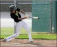  ?? JEN FORBUS — THE MORNING JOURNAL ?? Amherst’s Justin Hritsko swings during the Comets’ game against Bay in the Amherst Summer Classic on July 24.