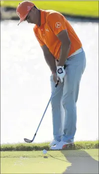  ??  ?? AP PHOTO Rickie Fowler hits from the edge of 18th green during the final round of the Hero World Challenge golf tournament at Albany Golf Club in Nassau, Bahamas on Sunday.