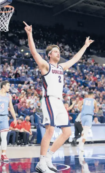  ?? YOUNG KWAK/AP ?? Drew Timme, a preseason All-American, returns and hopes to lead top-ranked Gonzaga to its first national championsh­ip.