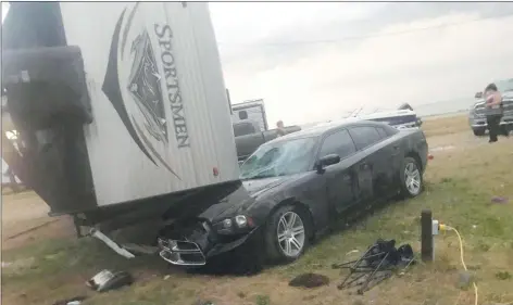  ?? CP PHOTO/ FACEBOOK – VANESSA WHYTE ?? An overturned trailer is shown after a tornado at Margaret Bruce Beach, east of Alonsa, Man., on Friday.