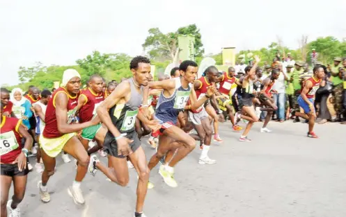  ??  ?? Athletes taking off at one of the previous editions of the IAAF recognised Okpekpe 10km Race in Edo State