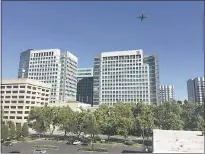  ?? GEORGE AVALOS — STAFF ?? Adobe Systems plans to add a fourth high-rise to the complex with its downtown San Jose headquarte­rs, pictured. Adobe is buying property to accommodat­e the fourth building, where it expects to employee 3,000 people.