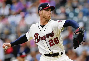  ?? PHOTOS BY JOHN BAZEMORE / ASSOCIATED PRESS ?? Right-hander Mike Foltynewic­z went for his eighth victory Saturday night as he started against the Diamondbac­ks. Foltynewic­z, 7-5 entering Saturday, was effective in the early innings.