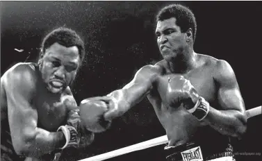  ??  ?? Joe Frazier and Muhammad Ali.