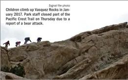  ?? Signal file photo ?? Children climb up Vasquez Rocks in January 2017. Park staff closed part of the Pacific Crest Trail on Thursday due to a report of a bear attack.