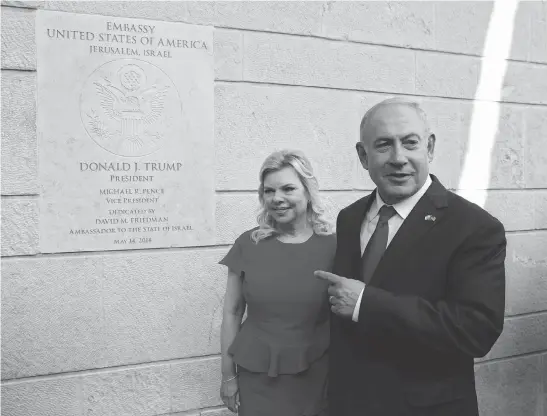  ?? SEBASTIAN SCHEINER / THE ASSOCIATED PRESS ?? Israeli Prime Minister Benjamin Netanyahu and his wife Sara attend the opening ceremony of the new U.S. Embassy in Jerusalem on Monday.