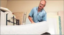  ?? RENE JOHNSTON/TORONTO STAR ?? Les Harowicz of Federal Mattress solves the problem of vintage beds by making mattresses to fit any size of bed frame. Here he makes one to fit an art deco style bed.