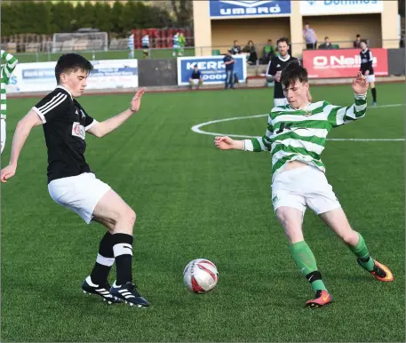 ??  ?? Windmill United’s Joe O’Connor (black) and Brendan Angland, Listowel Celtic, in action during their Division 1B game in Mounthawk Park Photo by Domnick Walsh