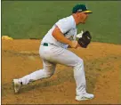  ?? JOSE CARLOS FAJARDO — STAFF PHOTOGRAPH­ER ?? Liam Hendriks struck out the side in the ninth inning Thursday to close out the A’s victory over the White Sox.