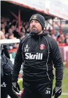  ??  ?? Dale Bedford on the touchline as manager for Tamworth (Picture Getty) and inset, between the sticks for Tamworth during his playing days