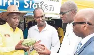  ?? CONTRIBUTE­D PHOTOS ?? From left: Norman Grant, president, Jamaica Agricultur­al Society (JAS); Dr Ronald Blake, executive director, Jamaica 4-H Clubs; Christophe­r Emanuel, chief executive officer, JAS; and Steadman Fuller, Custos rotolorum, St Andrew, in deep discussion...