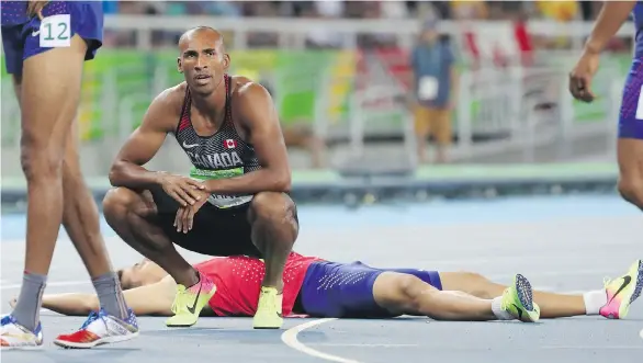  ?? PHOTOS: JEAN LEVAC ?? Decathlon bronze-medallist Damian Warner locked down his first Olympic podium finish Thursday, becoming only the second Canadian to win a medal in the decathlon.