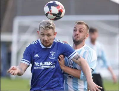  ?? ?? Lee Mccullagh of Beragh and Lisbellaw’s Jamie Coalter in action during the sides league meeting at Drumad on Saturday.