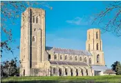  ??  ?? The Rev Catherine Relf-pennington, left, is vicar of Wymondham Abbey, above, in Norfolk