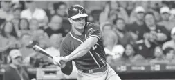  ?? DAVID J. PHILLIP/AP ?? Athletics third baseman Matt Chapman bats against the Astros on Sept. 10 in Houston.