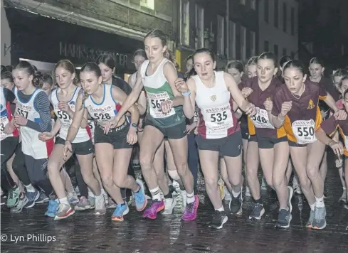  ?? ?? Above, the senior girls start
Left: The first three senior women home Right: The top three Year 5 girls Below left:
Three of the top secondary school boys