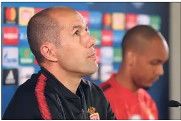  ?? (Photo AFP) ?? Le coach portugais s’est présenté en conférence de presse au côté de Fabinho.