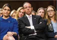  ?? DOUG MILLS / THE NEW YORK TIMES ?? Rod Rosenstein (center), the deputy attorney general, is expected to meet with the House Judiciary Committee in the next few weeks about allegation­s made against him in a New York Times article.