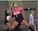  ?? ?? Atlantic Coast's Gaby Rourke clears the net in a Gateway Conference semi.