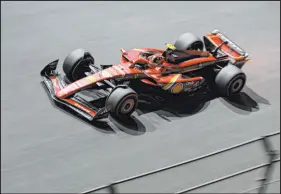  ?? Darko Bandic The Associated Press ?? Ferrari driver Carlos Sainz of Spain steers his car during practice ahead of the Formula One Saudi Arabian Grand Prix.