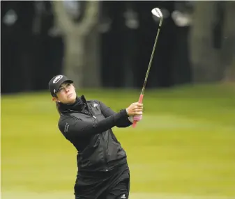  ?? Eric Risberg / Associated Press ?? Paula Creamer follows her shot to the 18th green. She went six months without playing a competitiv­e round of golf. She’s rebounding after undergoing surgery on her left wrist.