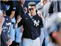  ?? AP-Yonhap ?? New York Yankees left fielder Juan Soto walks on the dugout during a spring training baseball game against the Minnesota Twins in Tampa, Fla., Feb. 26.