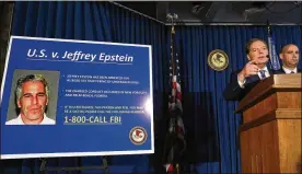  ?? THE NEW YORK TIMES ?? Geoffrey Berman, the U.S. attorney for the Southern District of New York, talks about the unsealing of sex-traffickin­g charges last month against Jeffrey Epstein. After Epstein’s death, prosecutor­s are turning their attention to those who may have helped him in a sex-traffickin­g ring, and accusers still plan to pursue lawsuits.