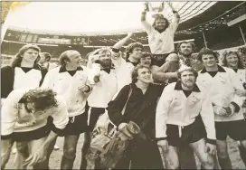  ??  ?? CHAMPIONS: Hoddesdon Town lift the FA Vase in the inaugural final at Wembley