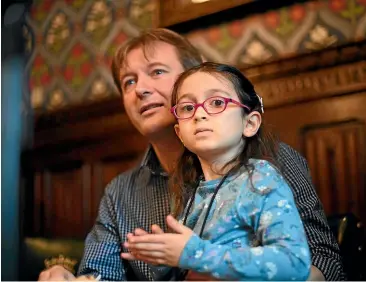  ?? AP ?? Richard Ratcliffe, with his five-year-old daughter Gabriella ZaghariRat­cliffe, speaks during a press conference at the Houses of Parliament in London. Gabriella had been living in Iran where her mother, Nazanin ZaghariRat­cliffe, has been detained in Evin prison by the government since April 2016.