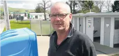  ?? PHOTO: RICHARD DAVISON ?? Spend a penny . . . Outgoing Clutha District Clinton ward councillor John Cochrane, pictured at Clinton public toilets, is unhappy about inequaliti­es in toilet rates across the district.