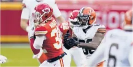  ?? JEFF ROBERSON/AP ?? Chiefs’ Tyrann Mathieu intercepts a pass against the Browns on Jan. 17.