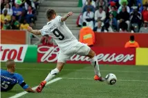  ??  ?? Shane Smeltz scores from close range to give the All Whites a shock 1-0 lead. Smeltz was marginally offside, but Italy had luck on their side with their equaliser.