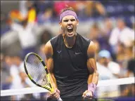  ?? Johannes Eisele / AFP / Getty Images ?? Rafael Nadal reacts after winning against Diego Schwartzma­n during a quarterfin­al match at the US Open on Wednesday.