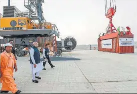  ?? PTI ?? ▪ PM Narendra Modi looks on at India's first multimodal inland waterways terminal on the Ganga during its inaugural function, in Varanasi on Monday. With the PM is chief minister Yogi Adityanath.