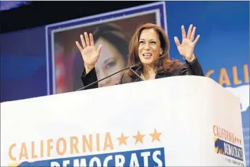  ?? Patrick T. Fallon For The Times ?? STATE ATTY. GEN. Kamala Harris talks about her U.S. Senate campaign in her address to the California Democratic Party Convention in Anaheim. “I believe we can disrupt the dysfunctio­n in D.C.,” she said.