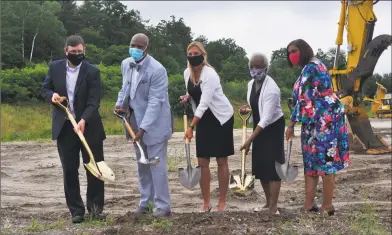  ?? New Opportunit­ies / Contribute­d photo ?? New Opportunit­ies broke ground on a greenhouse project in Torrington. From left are William Rybczyk, New Opportunit­ies research and developmen­t director; Dr. James H. Gatling, CEO and president; state Rep Michelle Cook; New Opportunit­ies board member Dr. Edie Joyce and the organizati­on’s director, Maria Gonzalez.