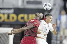 ?? (Photos: AFP) ?? Qatar forward Mohammed Muntari (left) and Honduras defender Johnny Leveron go for a header during the CONCACAF Gold Cup Prelims football match at BBVA Stadium in Houston, Texas on July 20, 2021.