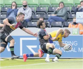  ?? PICTURE: Harry Browne/getty Images ?? Ruaridh Mcconnochi­e, pictured scoring a try for Bath against Harlequins, has been named the Players’ Player of the Season and Best Back whilst also being the club’s leading try scorer this season