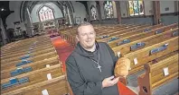  ?? CHRONICLE HERALD ?? Chad McCharles is a Benedictin­e monk/Anglican minister at St. James Anglican Church in Mahone Bay and also a former baker. He is seen in the church on Sept. 20.