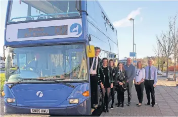  ??  ?? Driving force Scott Ferguson, First Group, staff manager (Behind wheel). Ben Edwards, Kirsty Macdonald, (both Balfron High School), Sorcha McGroarty, Hazel Lafferty, (both McLaren High School), Colin Cameron, (Chair of Balfron Community Council), Anne...