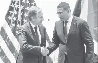 ?? REUTERS/Gilbert Bellamy ?? U.S. Secretary of State Antony Blinken and Jamaican Prime Minister Andrew Holness shake hands at the Pegasus Hotel in Kingston, Jamaica, March 11, 2024.
