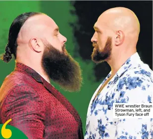  ??  ?? WWE wrestler Braun Strowman, left, and Tyson Fury face off