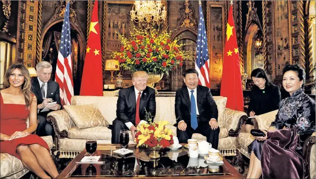  ??  ?? ALL SMILES: The president and Mrs. Trump join Chinese President Xi Jinping and wife Peng Liyuan Thursday at Mar-a-Lago, where the leaders “developed a friendship” (below).