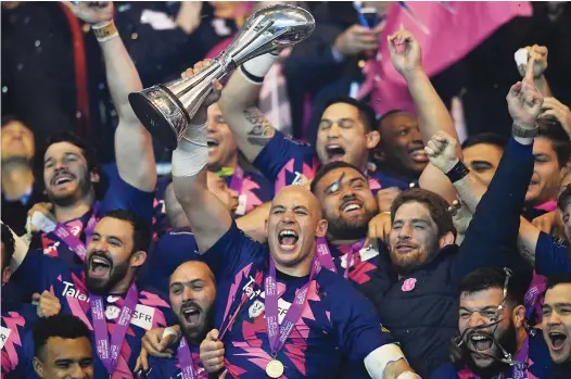  ?? PICTURES: Getty Images ?? Different class: Stade captain Sergio Parisse leads the trophy celebratio­ns