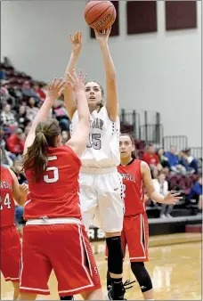  ?? Bud Sullins/Special to Siloam Sunday ?? Siloam Springs sophomore Shelby Johnson shoots over the Stilwell, Okla., defense during the second half of Friday’s girls homecoming game.